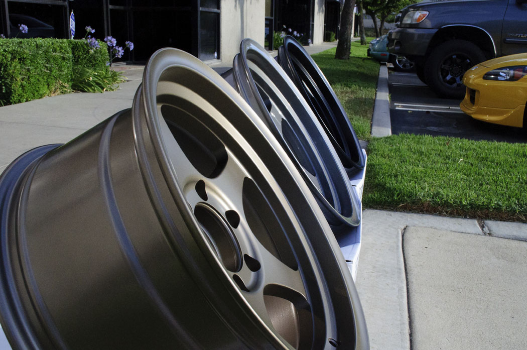 17x8.5 FN Five Star Matte Bronze Light Gunmetal Matte Black in natural light